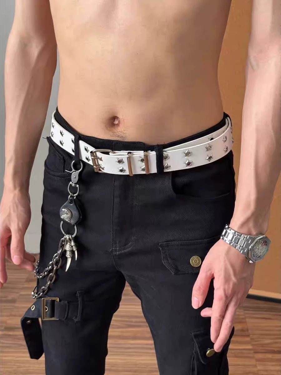 White Y2K belt with star-shaped grommets worn on black pants