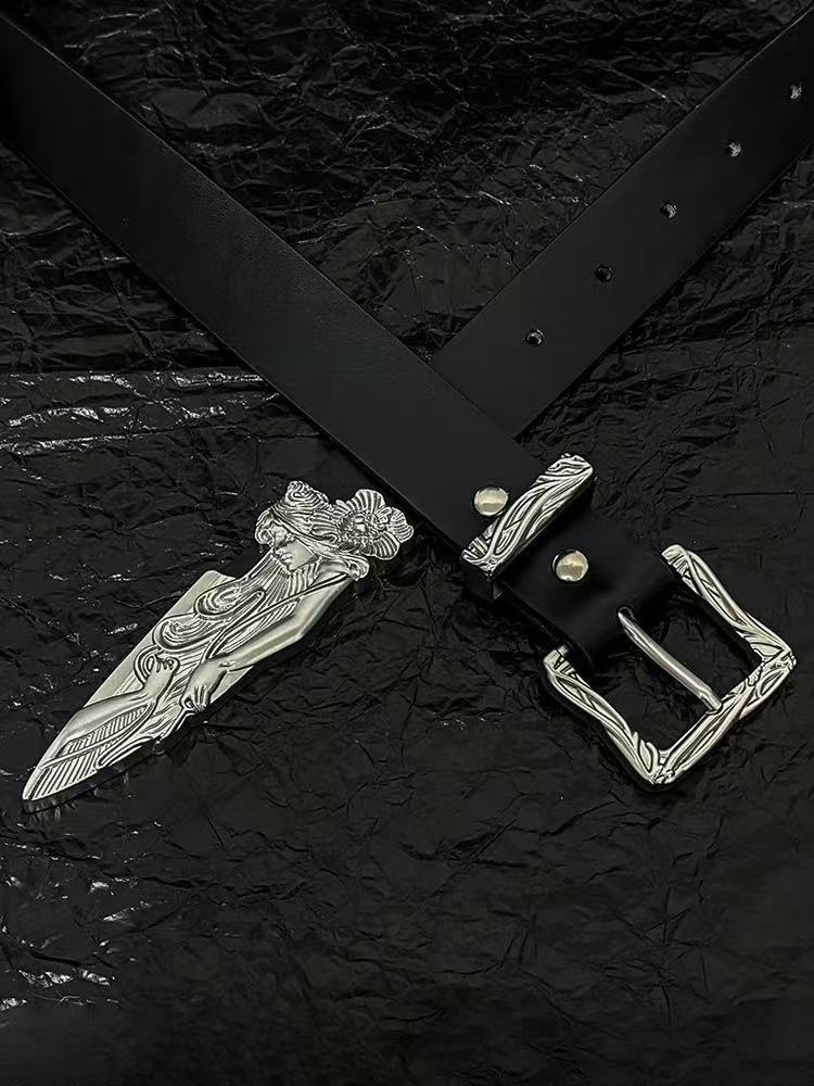 Black belt with carved western buckle and silver broken-sword tip