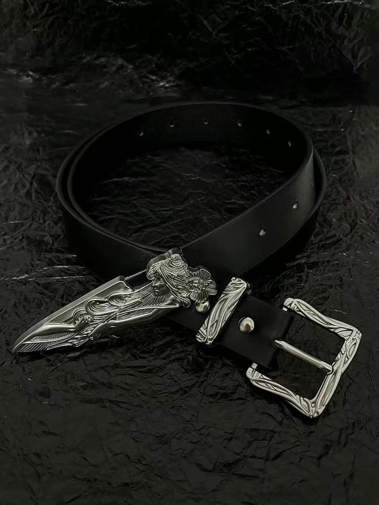 Black belt with carved western buckle and silver broken-sword tip