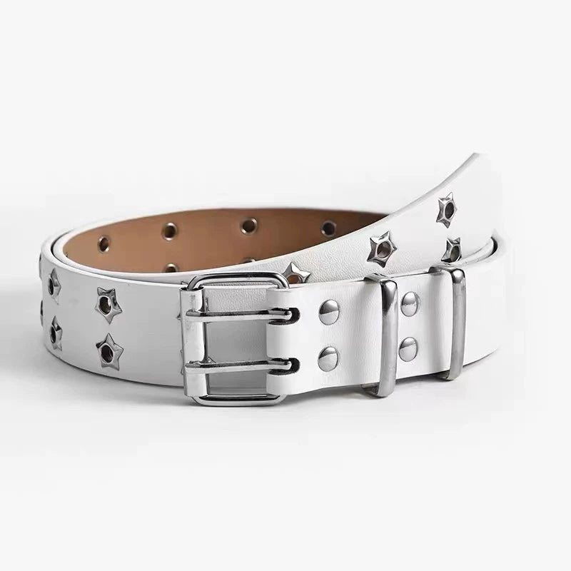 White Y2K belt with star-shaped grommets worn on black pants