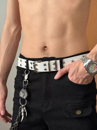 White Y2K belt with star-shaped grommets worn on black pants