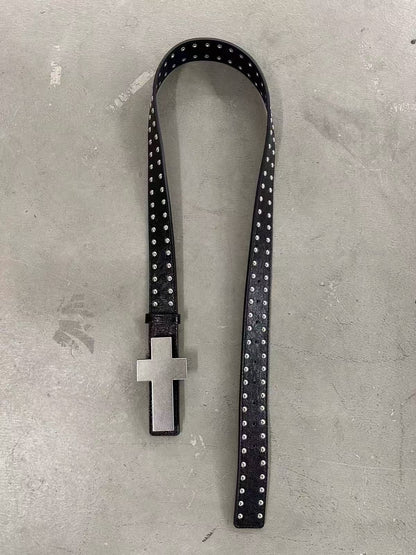 Black crackle belt with double-row dome studs and a large silver cross plaque
