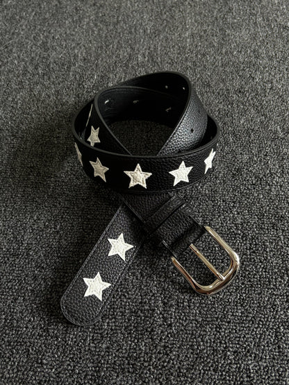 Black pebbled belt with white star inlays and a silver pin buckle
