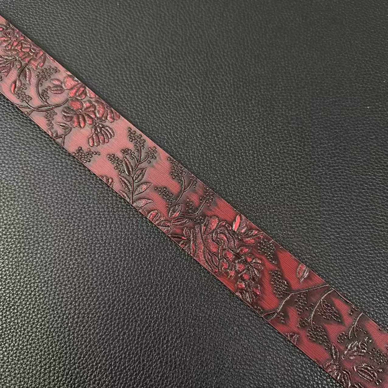 Burgundy rose-embossed western belt with double-horse oval buckle